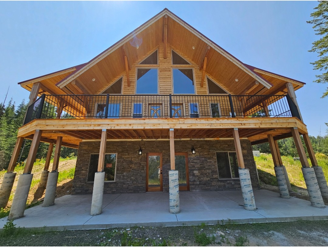 Finished log home with an amazing deck