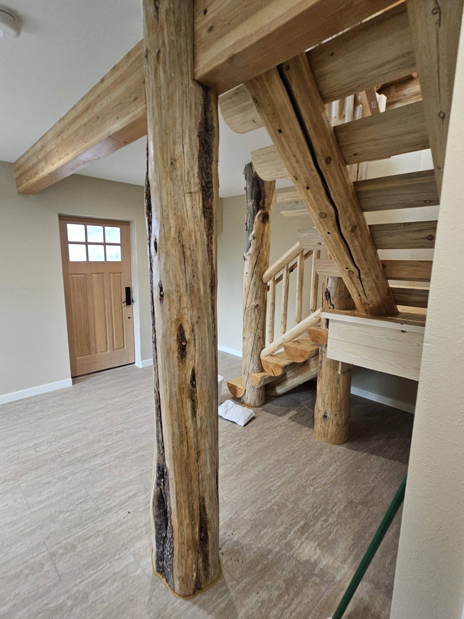 Custom log staircase craftsmanship